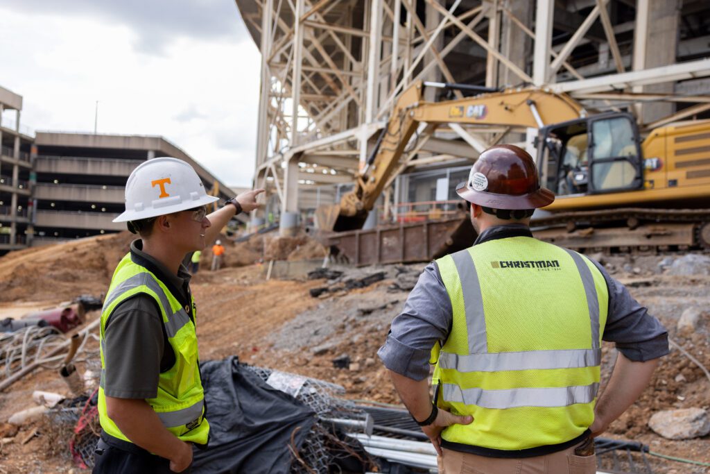 Two Construction Science & Management students at construction site